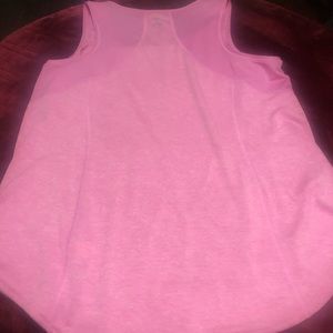 Like new worn once. Is in great condition. Great work out shirt or everyday wear